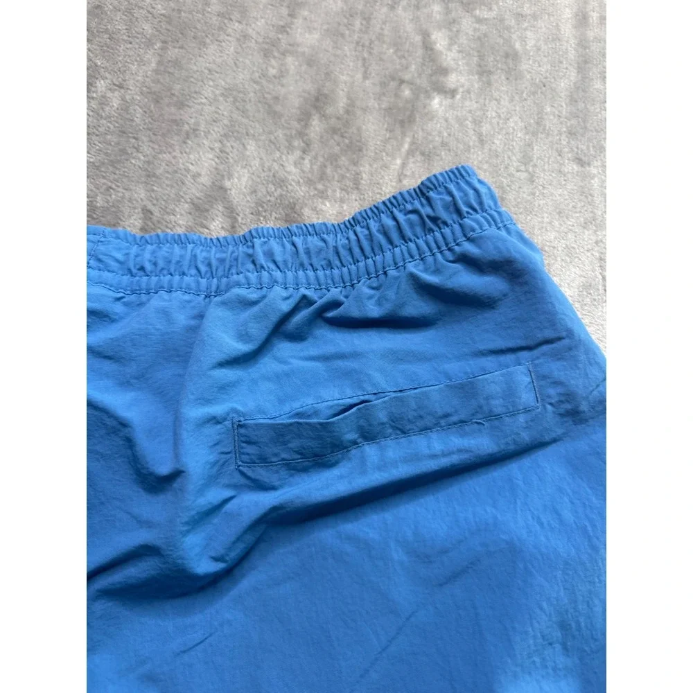 Nike Womens XL Everything Wovens Mid Rise Pants Star Blue Open Hem Baggy
